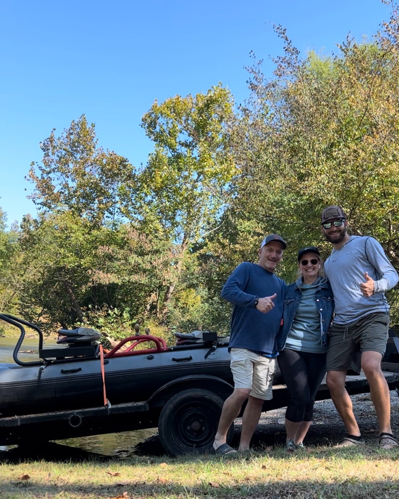 Three people enjoying fishing trip in VA