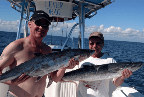 Two anglers with their catch of 2 big fish at Wrightsville Beach