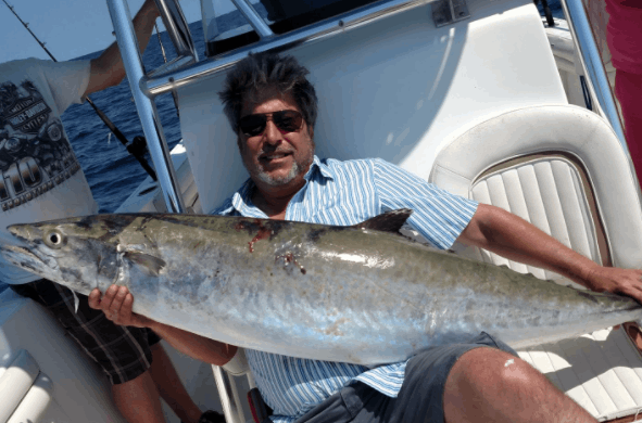 Photograph of a King Mackerel fish caught while fishing in North Carolina