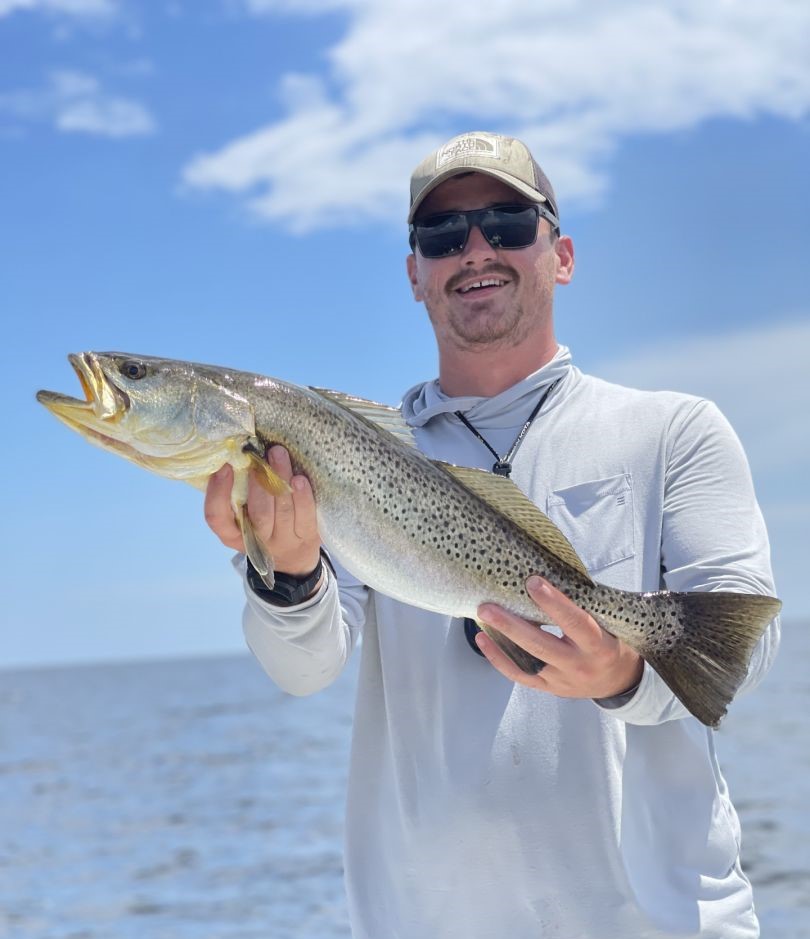 Angler holding a freshwater fish in Crawfordville