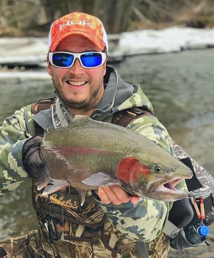 Angler with a 13-inch fish in NY