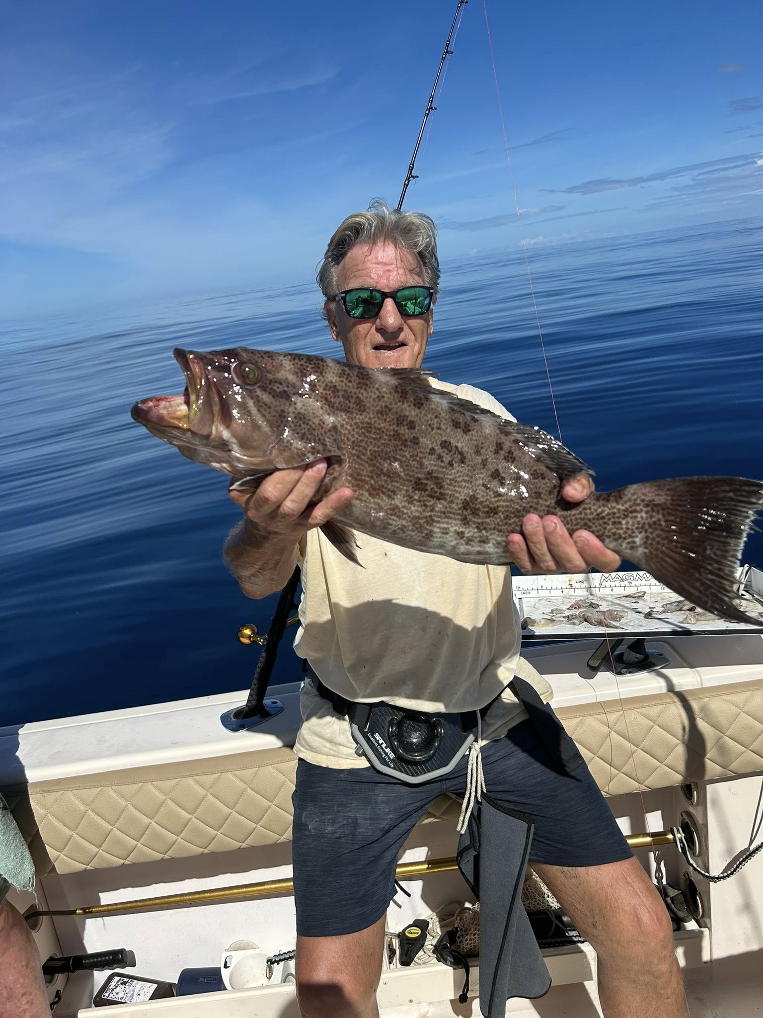 Scamp grouper caught fishing in Murrells Inlet SC displayed on boat deck