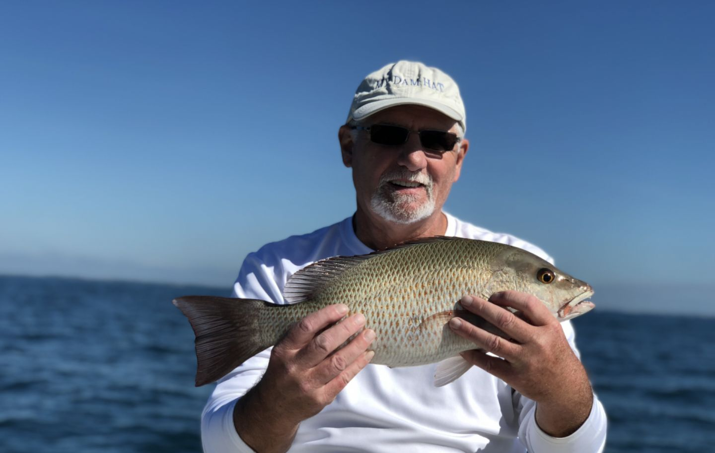 Photograph of a 17-inch Grey Snapper caught while fishing in FL.