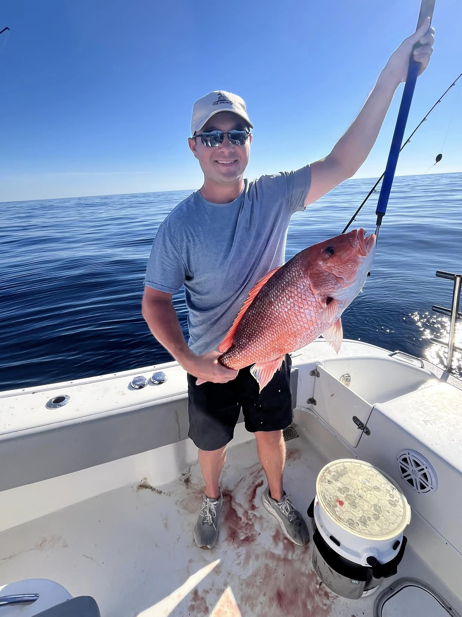 Angler with a catch in Fairhope