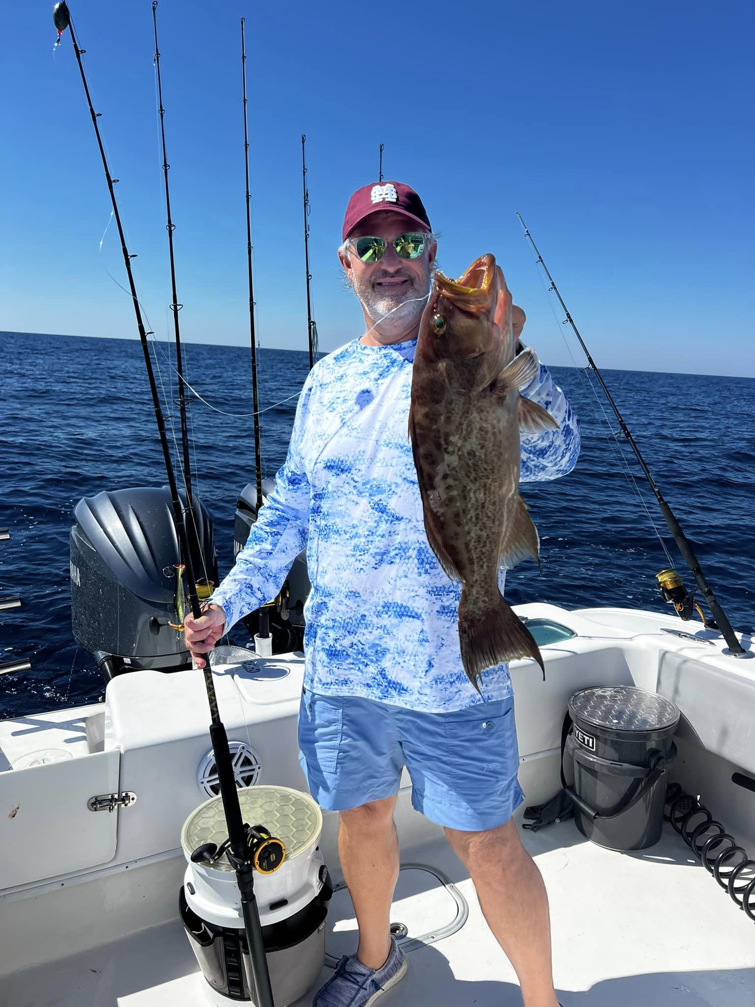 Gag grouper, a massive 24-inch fish, caught in Fairhope