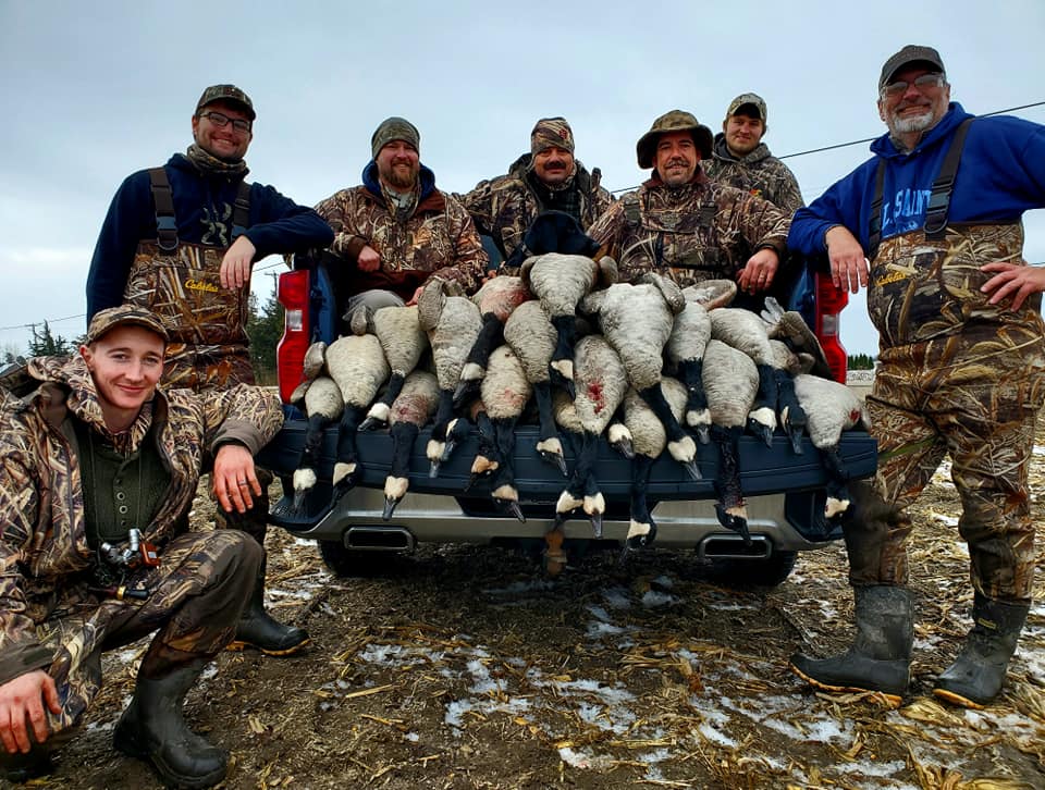 Group of 7 people fishing and hunting in Linwood