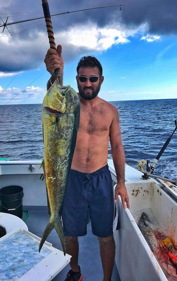 Angler holding a large fish in Destin
