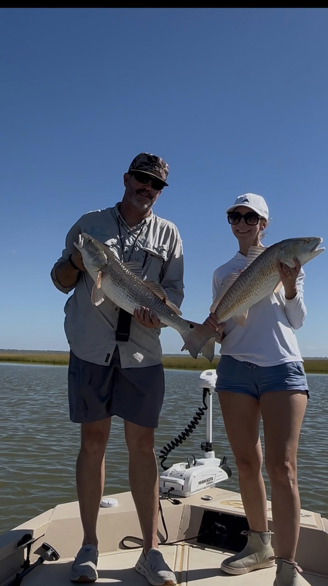 Two redfish caught during fishing trip in Palacios TX