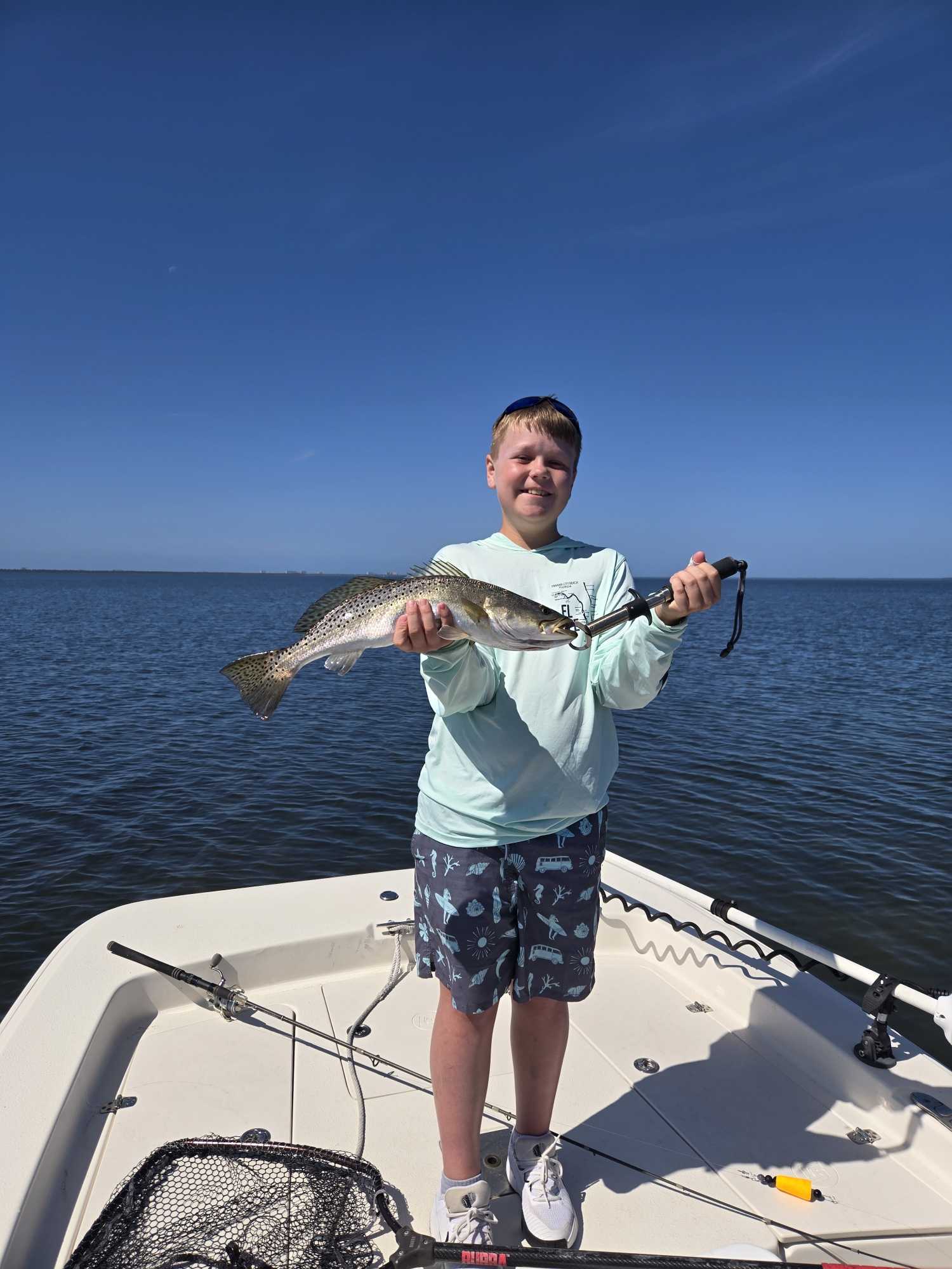 Kids fishing trip on shallow water flats boat - 2 hour family-friendly charter experience