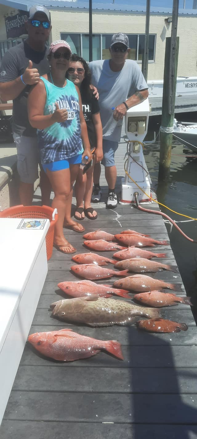 Two fishermen with their catch in Florida