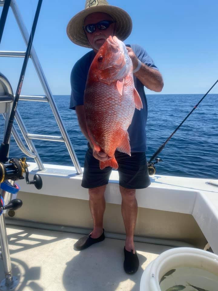 A person fishing at Panama City Beach