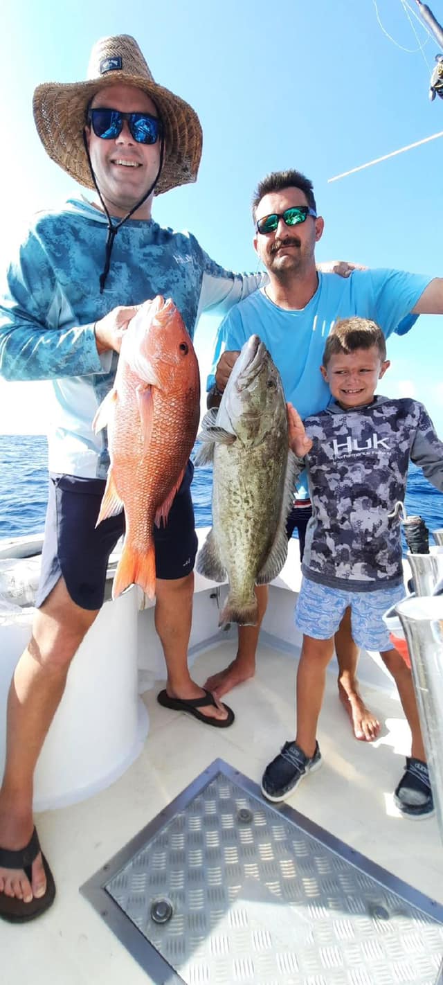Two gag grouper fish caught while fishing in FL