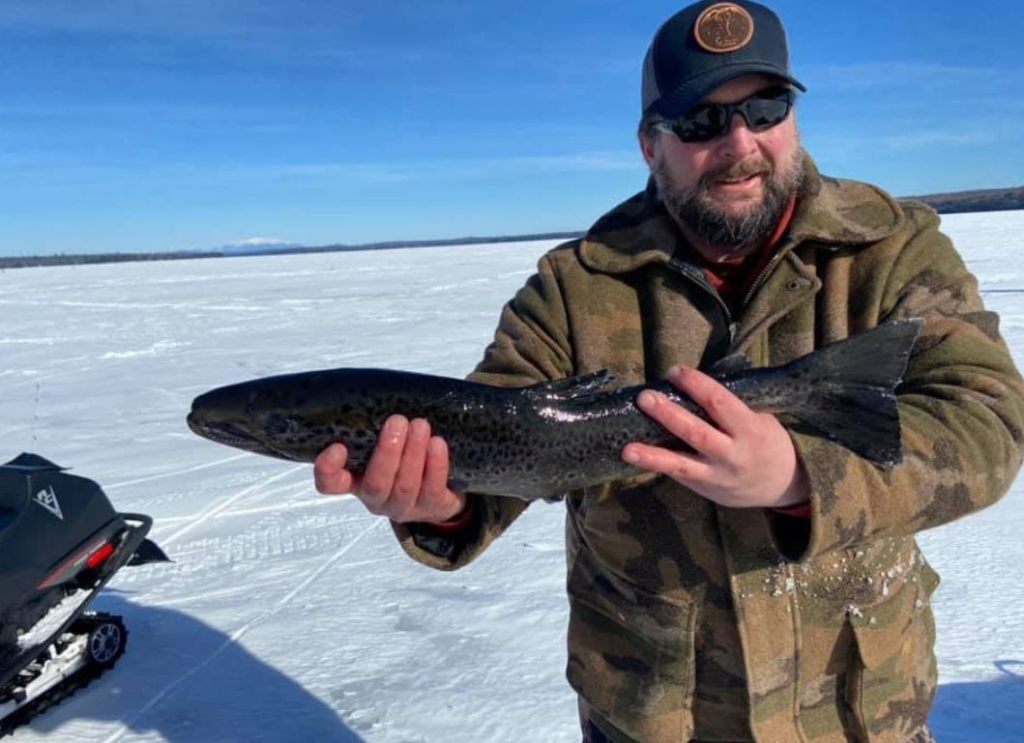 Photograph of a sea trout, 16 inches long, caught while fishing in ME