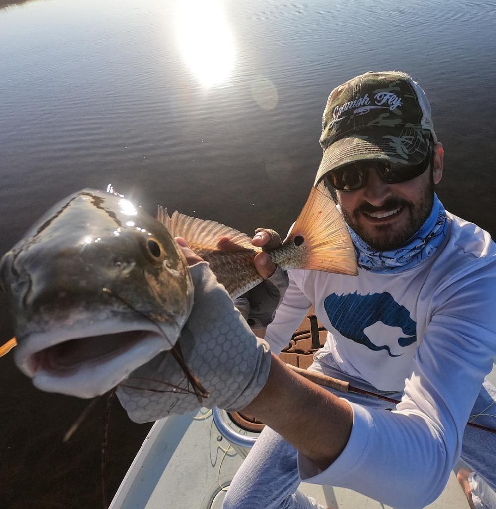 Angler casting fishing line in Corpus Christi