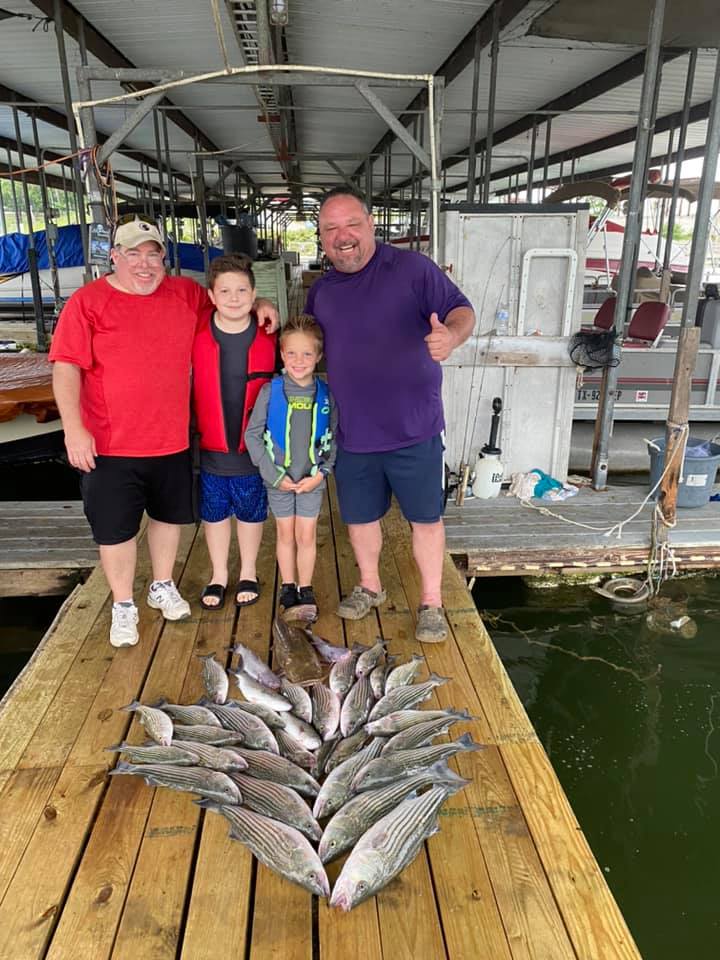 Four people fishing at Pottsboro