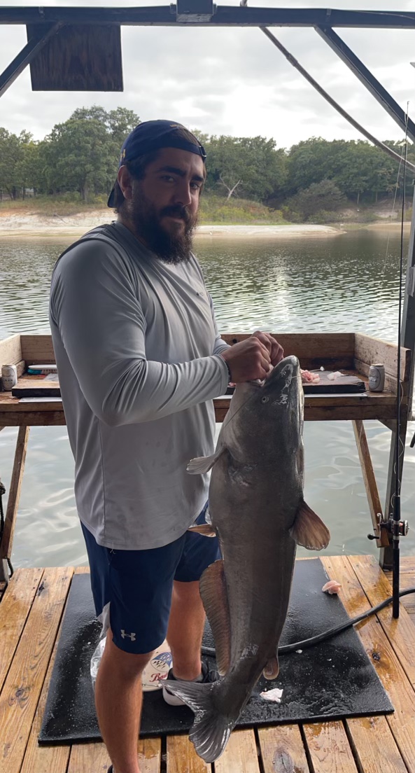 Angler with a blue catfish in Pottsboro