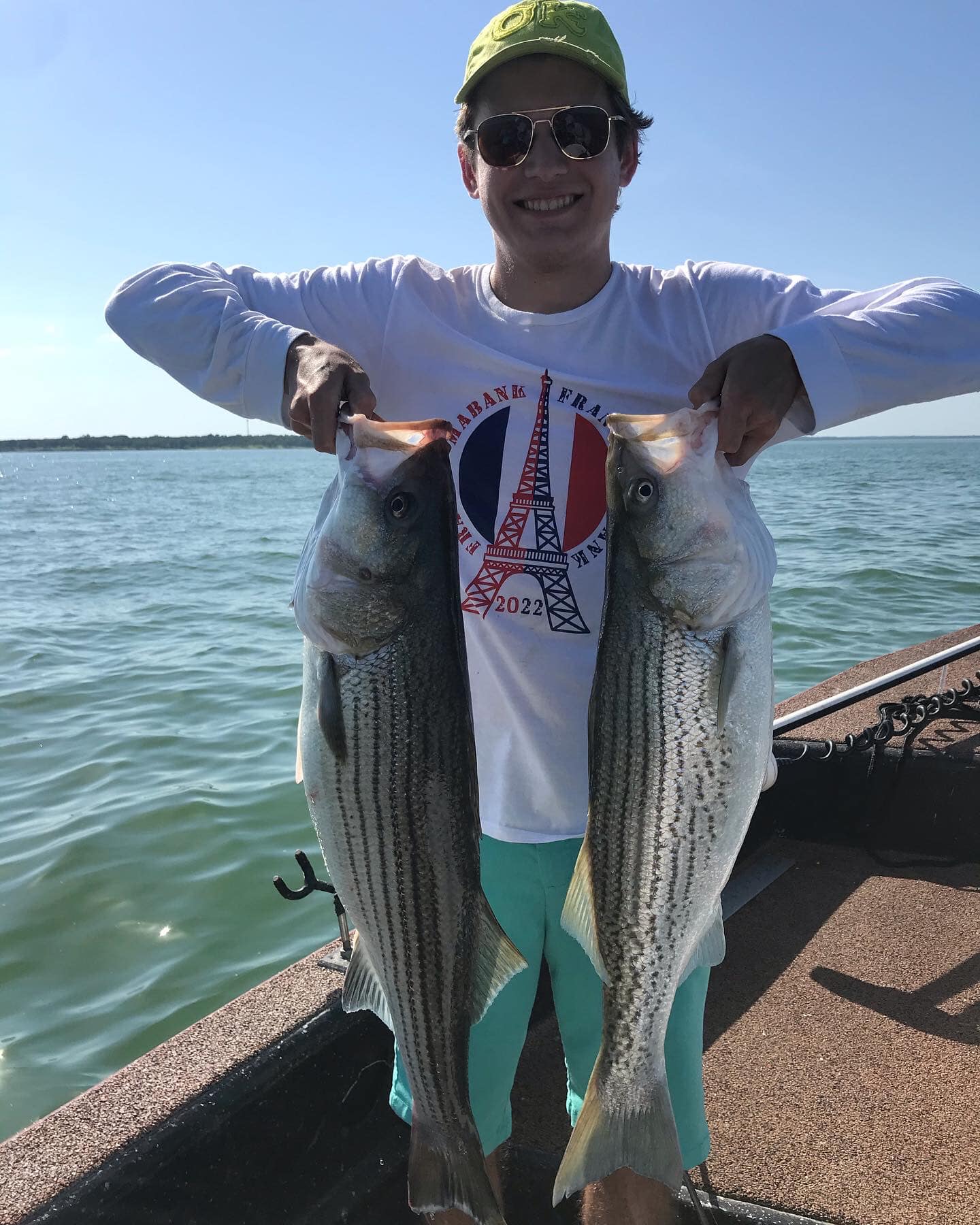 Two striped bass, 24 inches long, caught while fishing in Texas