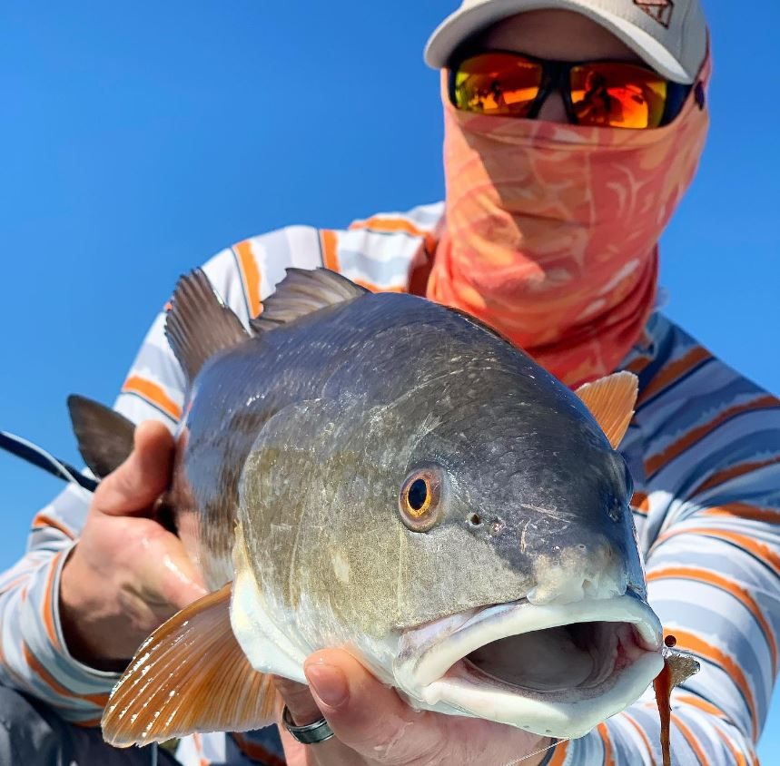 One fisherman with a fish catch in Fernandina Beach