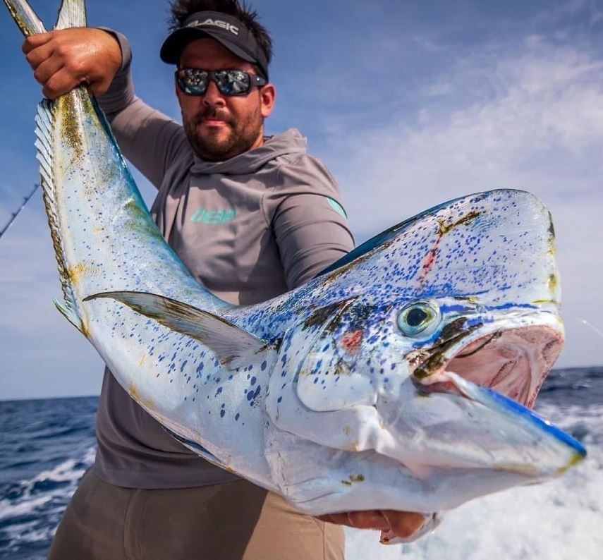 Two people fishing with a 27-inch catch in FL