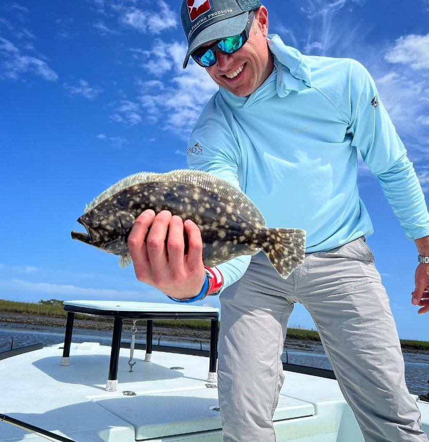 Angler with 15-inch fish in FL