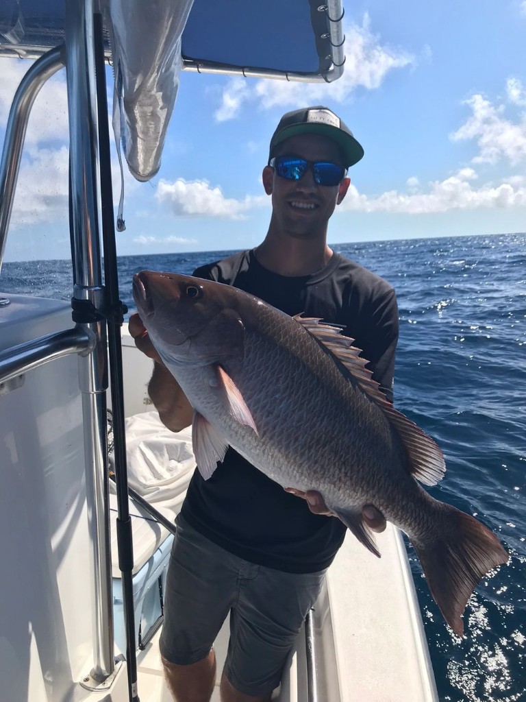 A Grey Snapper, a 23-inch fish, caught while fishing in New Smyrna Beach