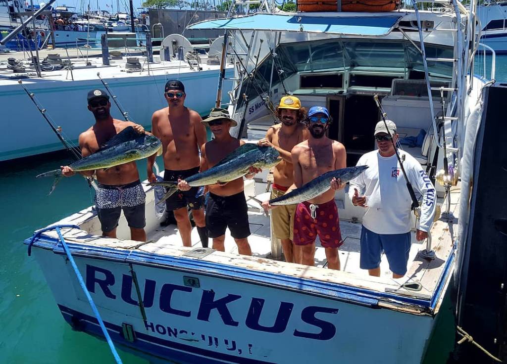 Six anglers with big 21-inch fish in Hawaii