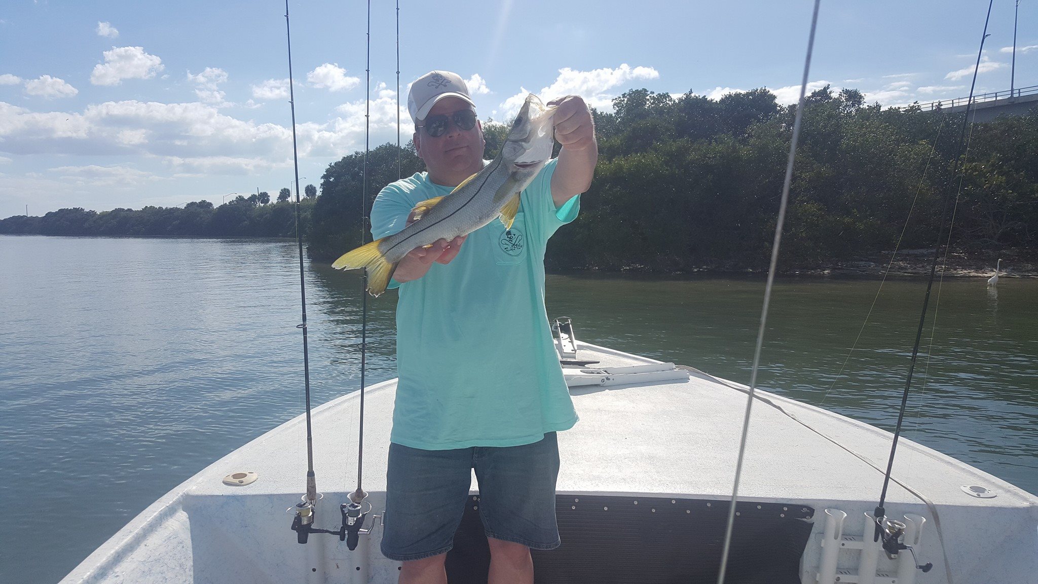 A person fishing on North Pinellas Avenue
