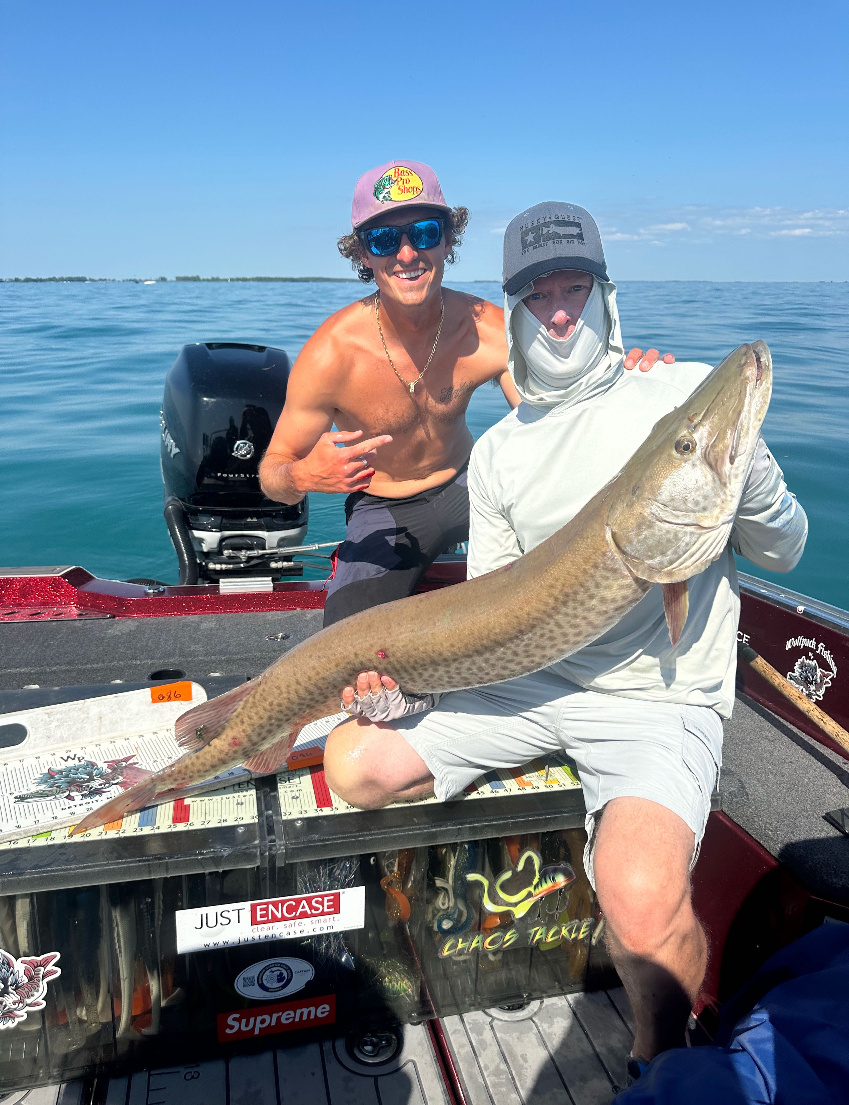 Two anglers fishing in Michigan with a big fish catch
