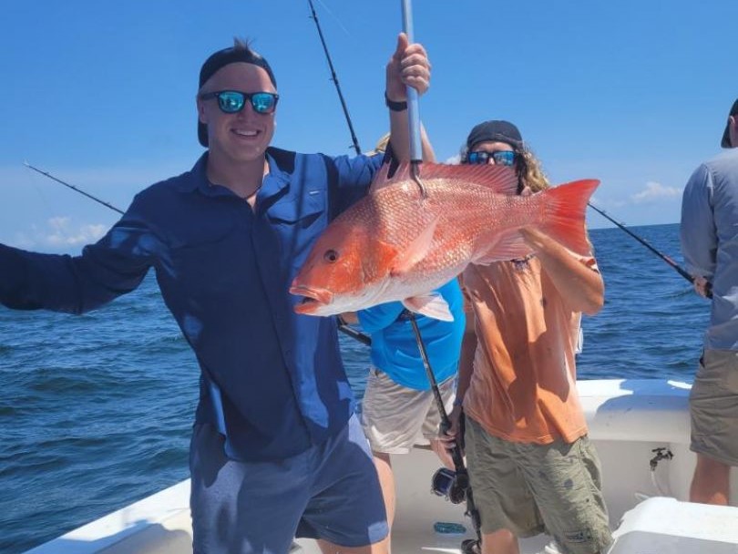 Angler with a single 18-inch fish in Alabama