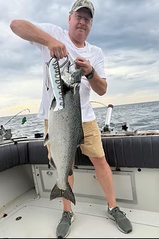 1983 Trojan 36ft fishing boat on Lake Ontario for salmon and trout charter trips in New York