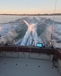 1983 Trojan 36' boat cruising Lake Ontario waters for full day booze cruise from Waterport NY