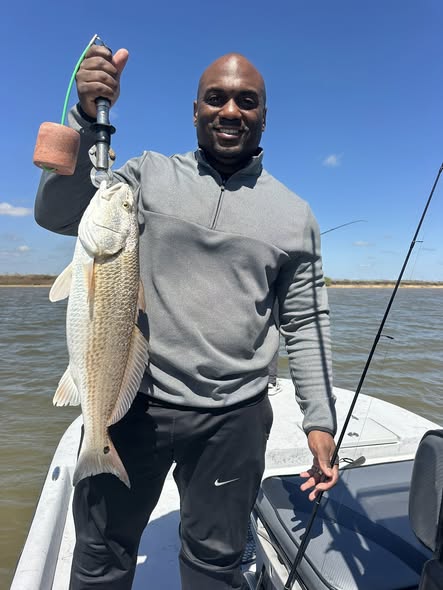 Successful redfish catch on fishing boat in Matagorda TX waters