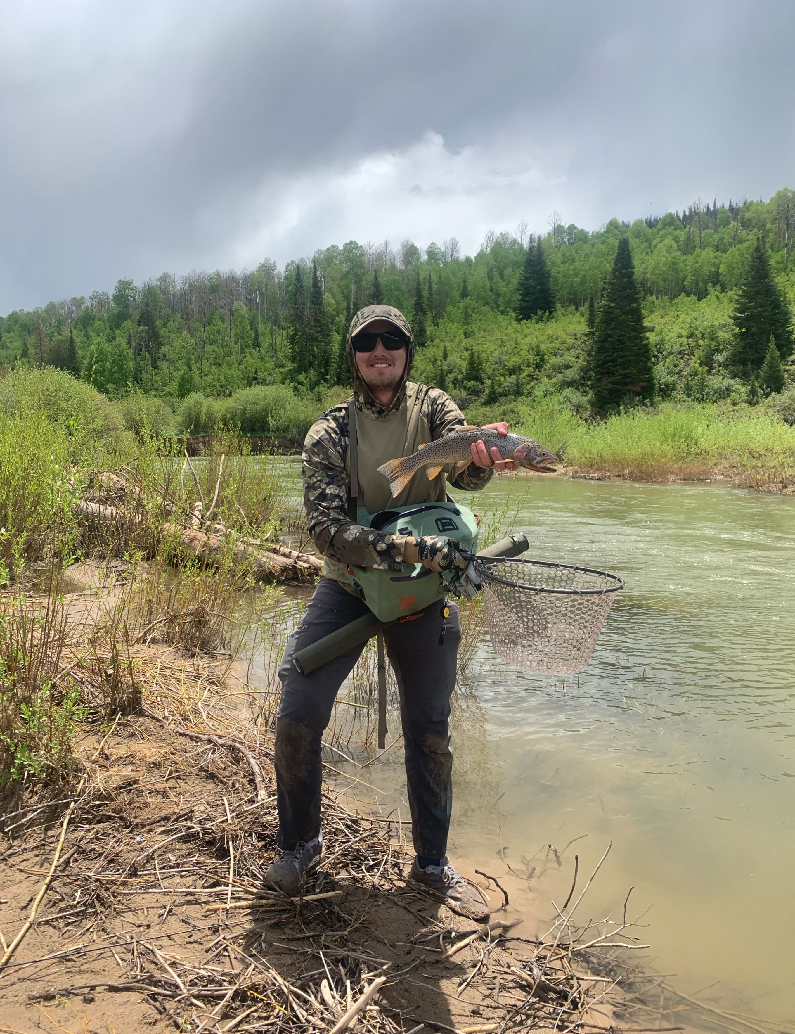Catching a beautiful rainbow trout in Cokeville