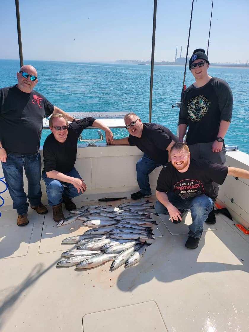 Group of 5 people fishing in Algoma