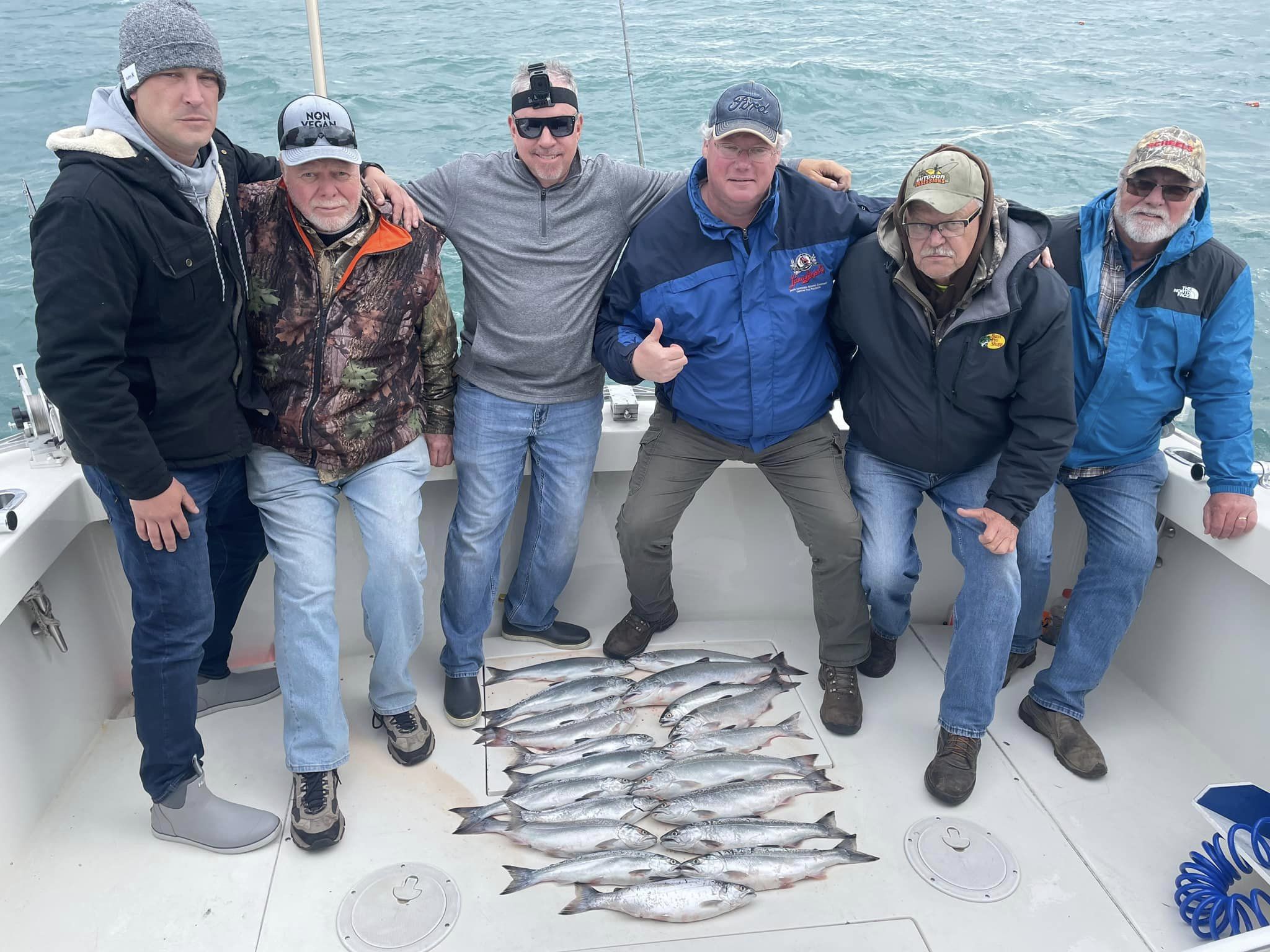 Group of 6 people fishing in Algoma