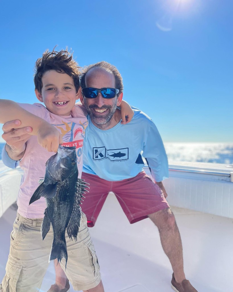 Two people fishing in Belmar, New Jersey