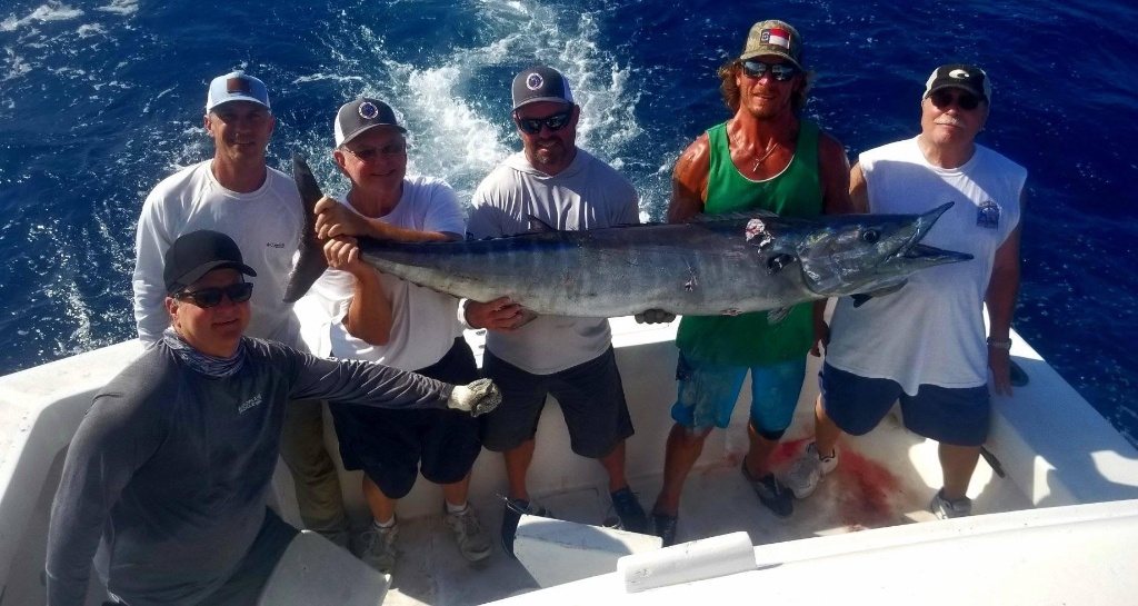 Group of 6 people enjoying fishing trip in NC
