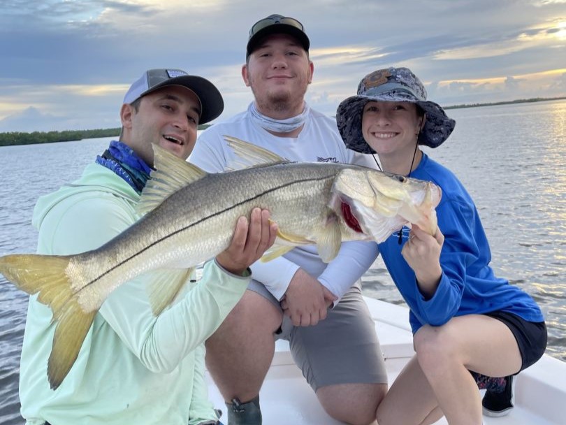 A huge snook fish caught by three people in Everglades City