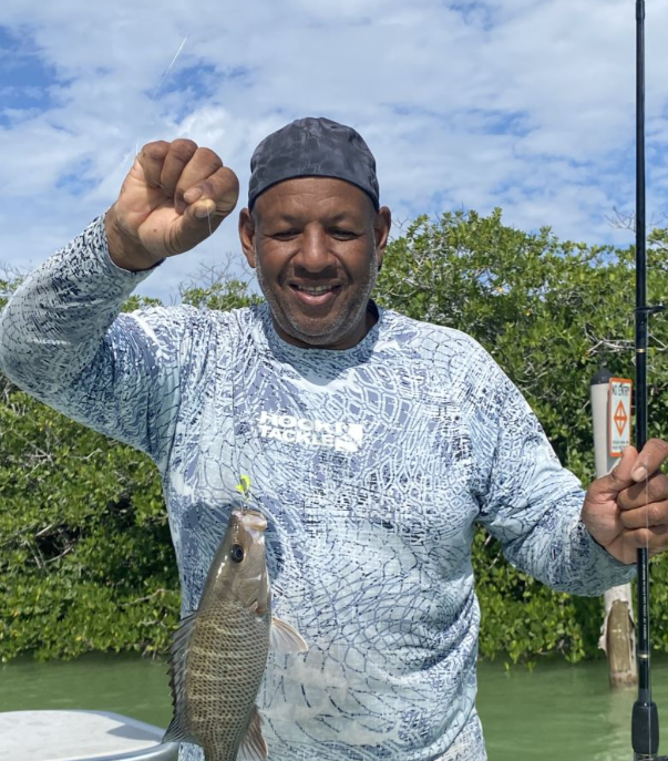 A grey snapper fish caught while fishing in Key Largo