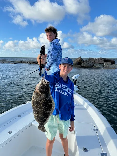 Summer flounder, 27 inches, fishing and tours at Port Bolivar