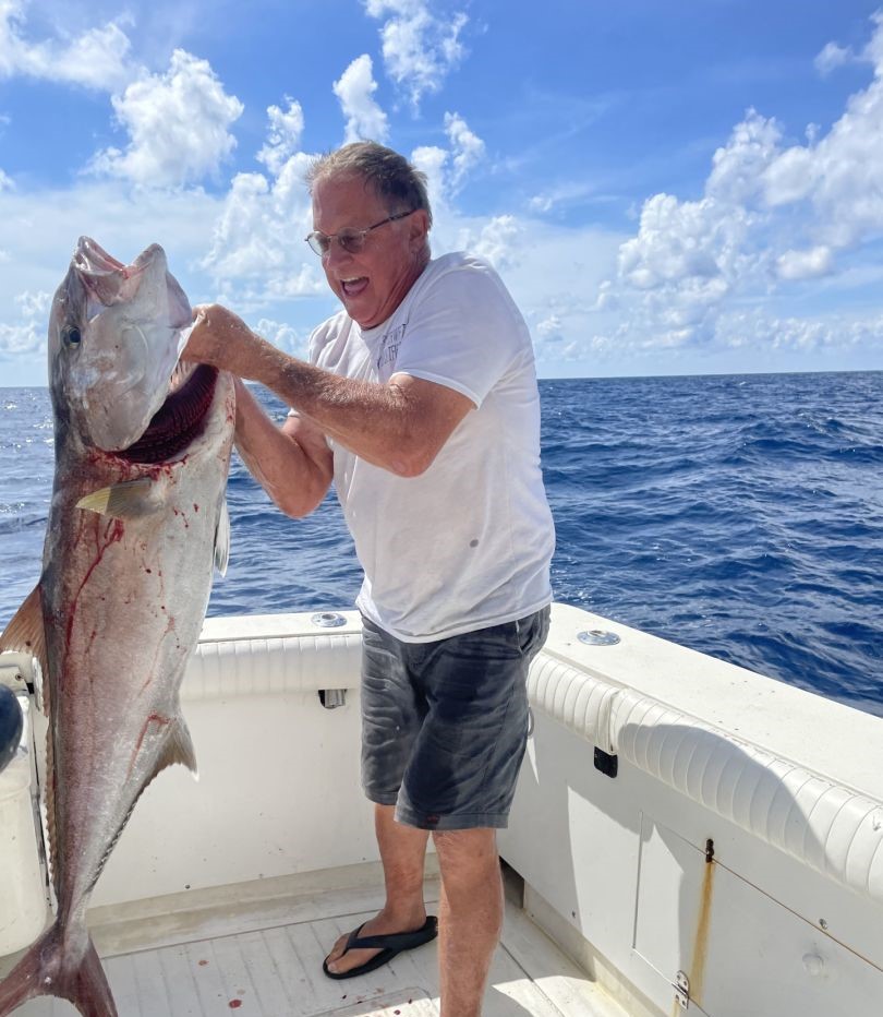 Angler holding a 35-inch fish in Port Aransas, Texas during a fishing tour