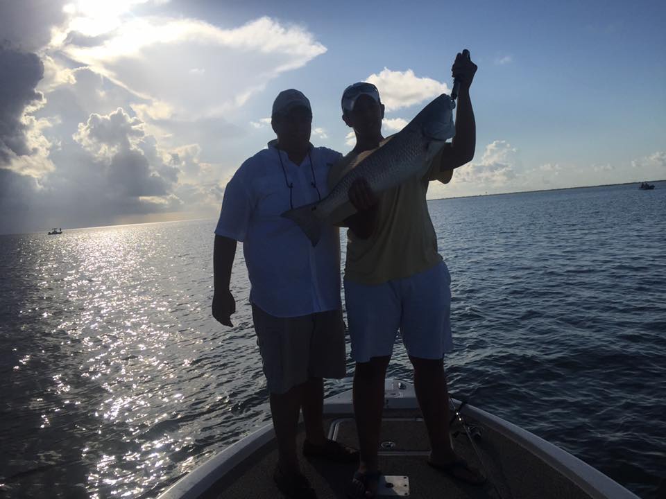 Angler holding a 25-inch fish in TX