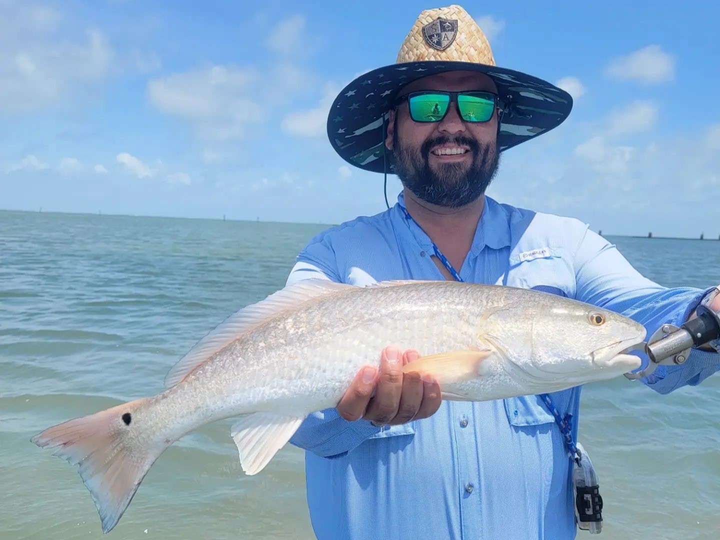 An angler with a big catch in Aransas Pass