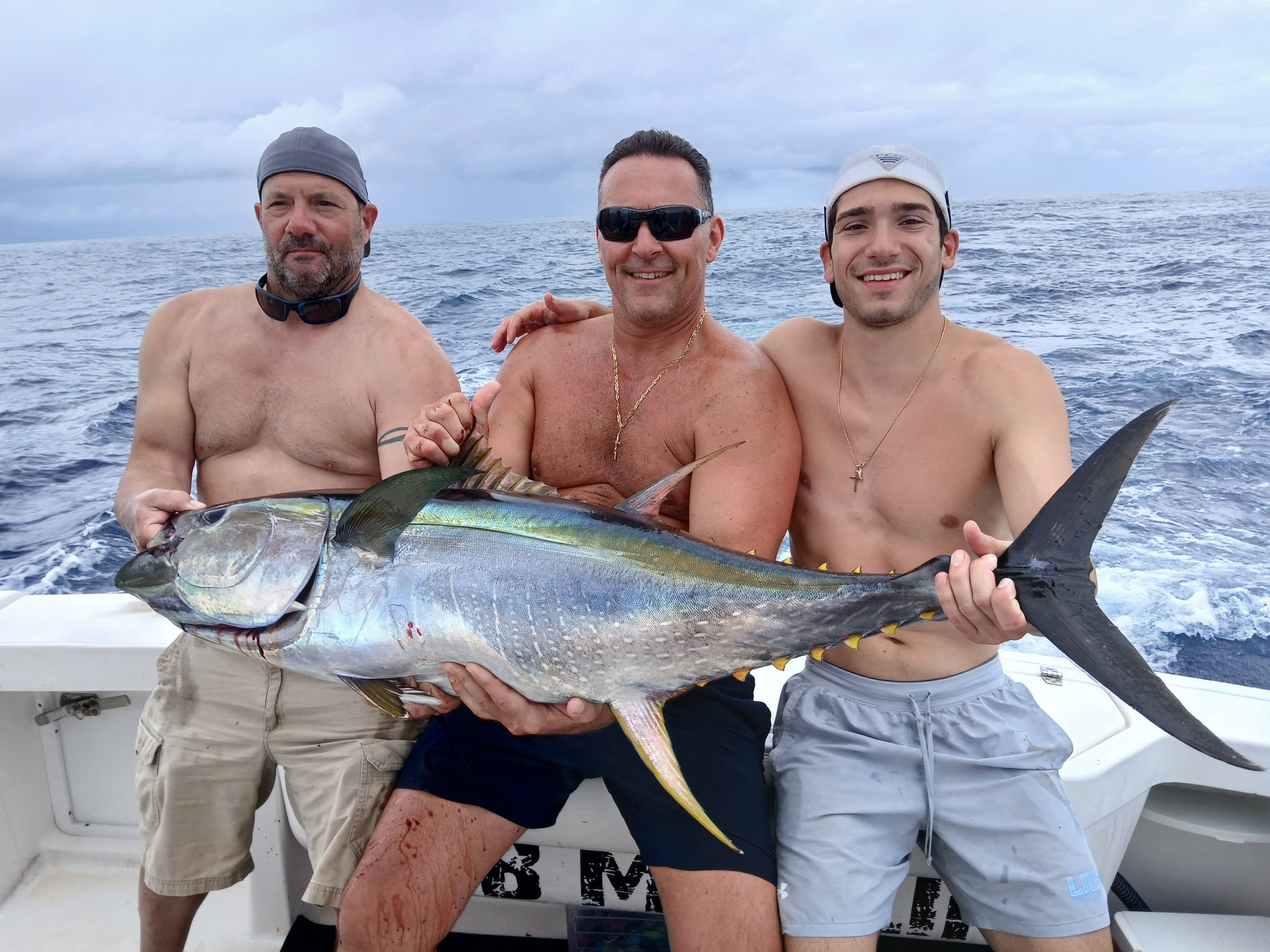 Three people in Puntarenas Province enjoying fishing tours