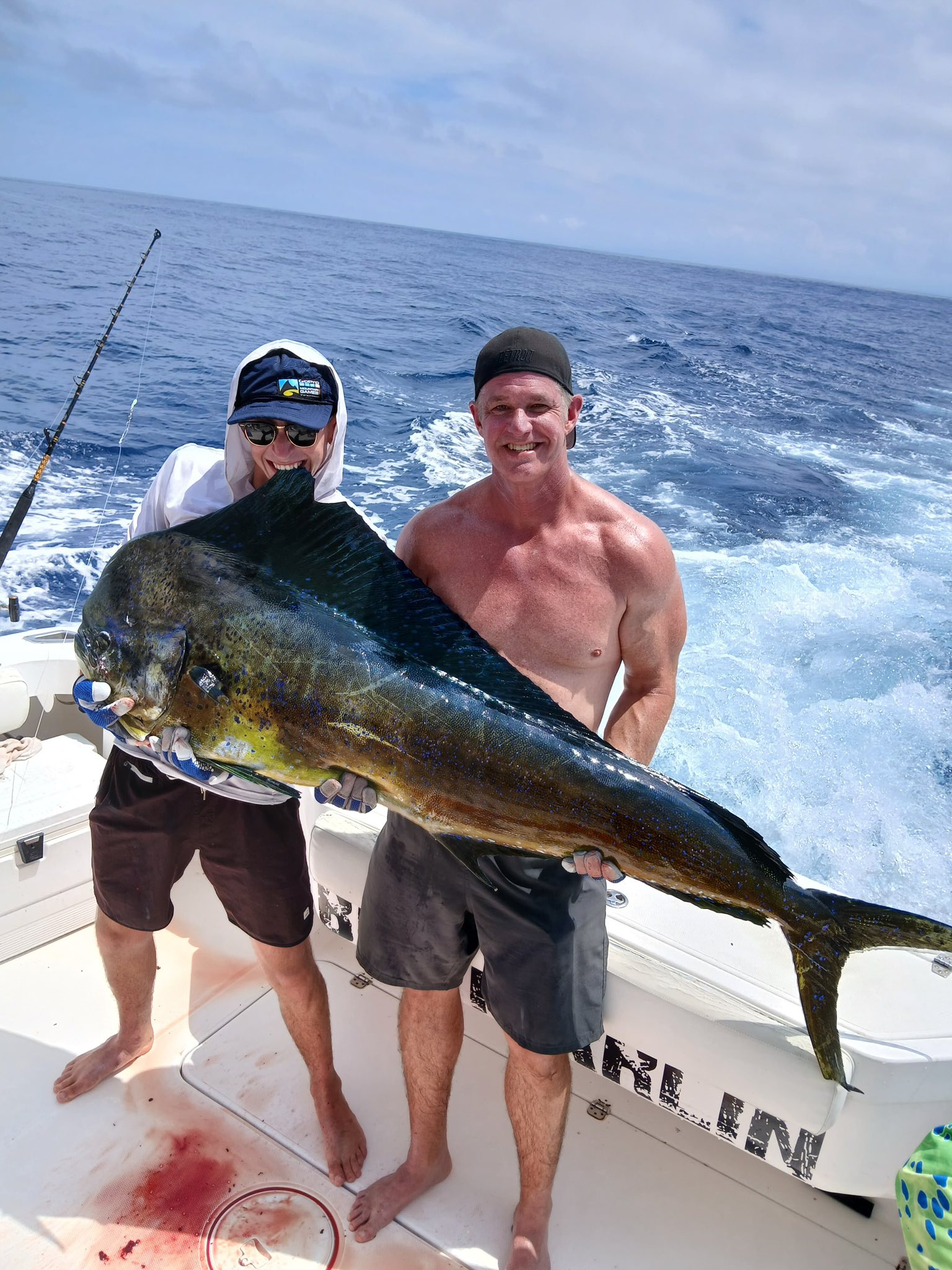 Two people fishing in Herradura