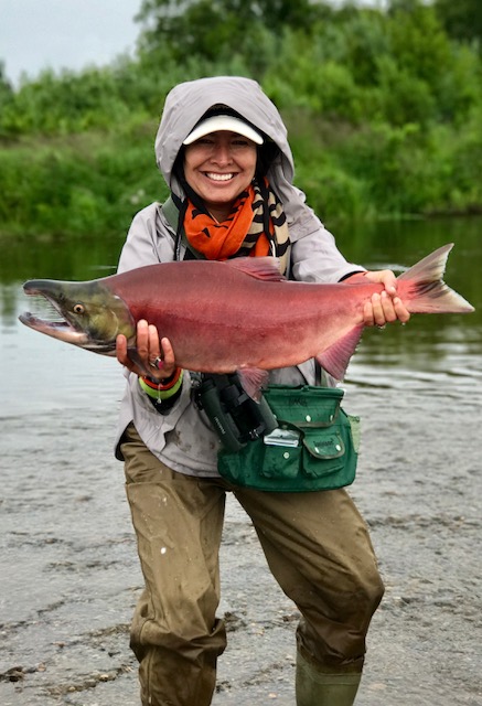Angler with a 21-inch fish on the AK shoreline