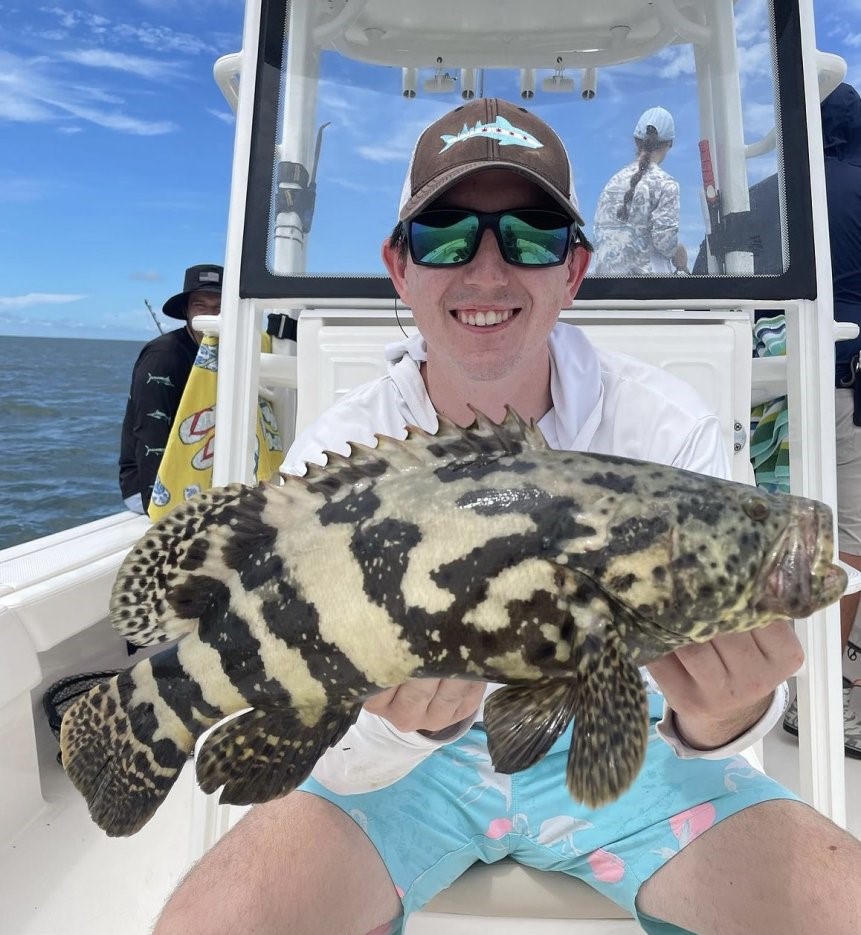 2 fishermen caught a 21-inch fish in FL