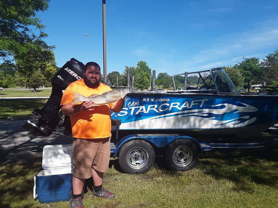 A lone angler in Sherrodsville enjoying a 19-inch catch