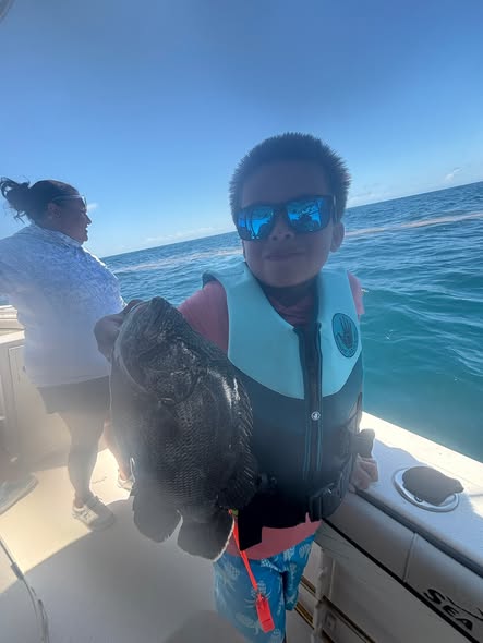Large black fish caught during fishing trip in Corpus Christi TX waters