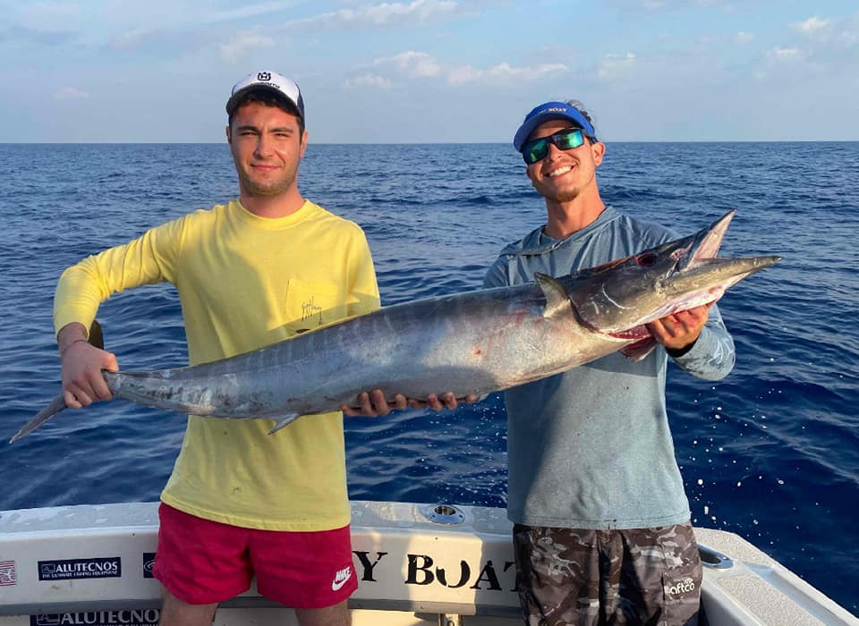 Anglers pose with their catch at Midway